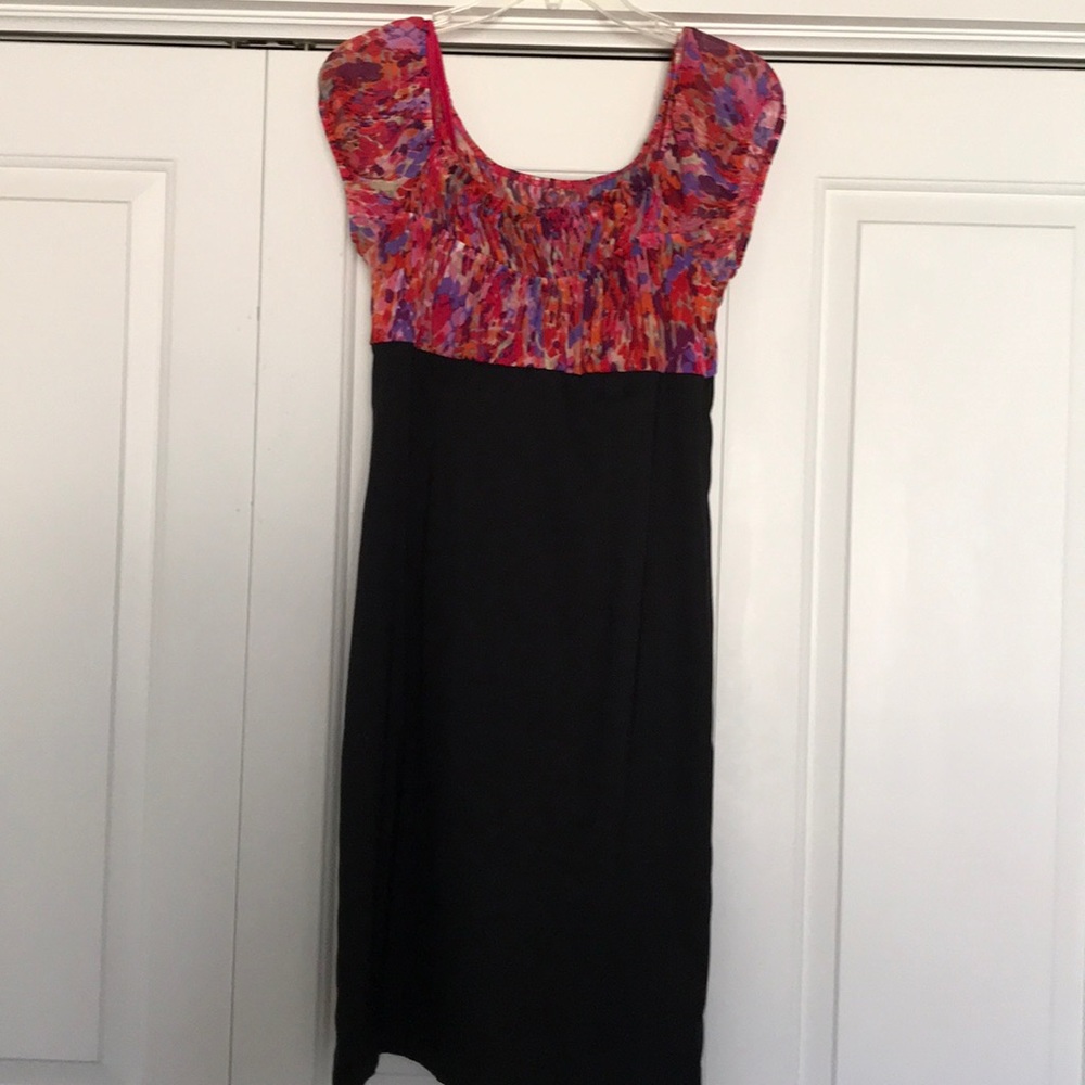 Pretty black dress with colorful trim.